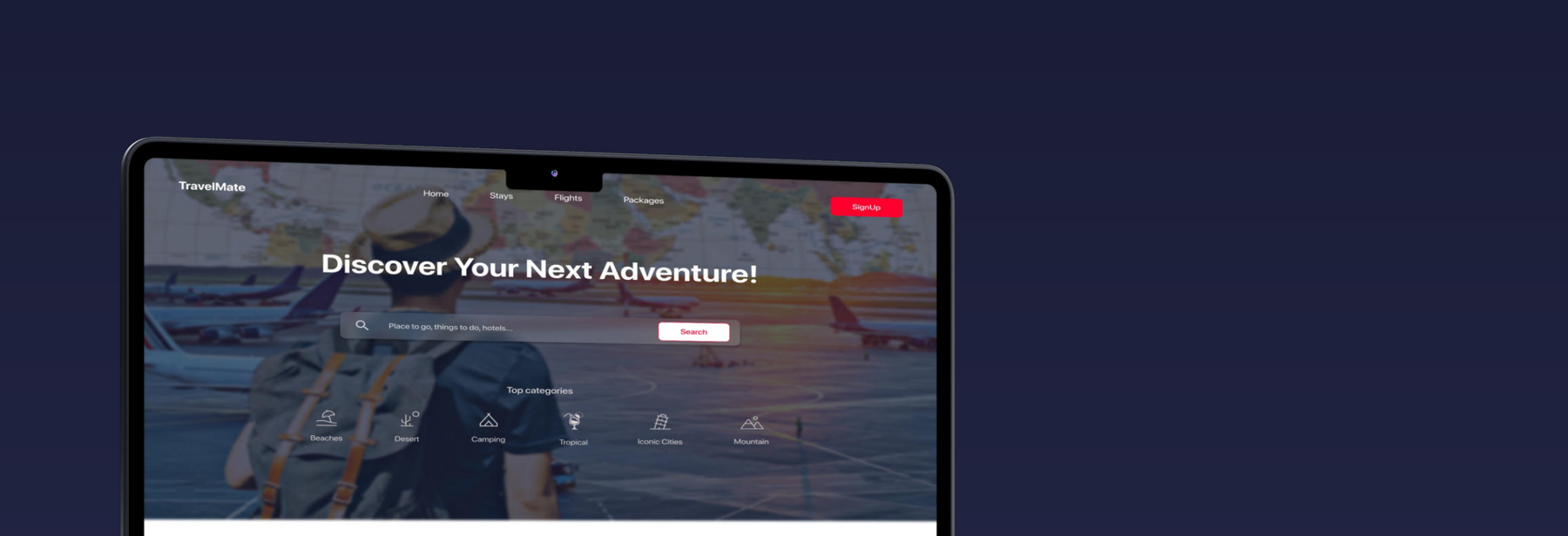 TravelMate home page shown on a laptop